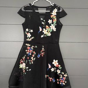 Guess Los Angeles embroidered dress. Shear dress over black slip. Size Medium